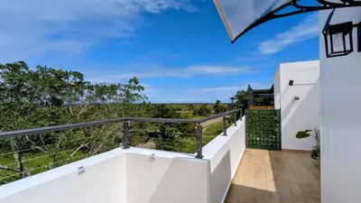 a view from the balcony of a house at Mountain View Penthouse Condo in Muñoz