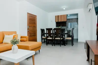 a living room with a couch and a table at Caribey2 APT 3D1 in Las Terrenas