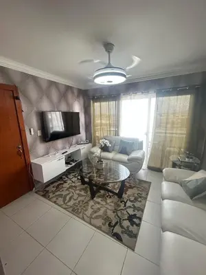 a living room with a couch and a table at Amalia Lucero in Mendoza