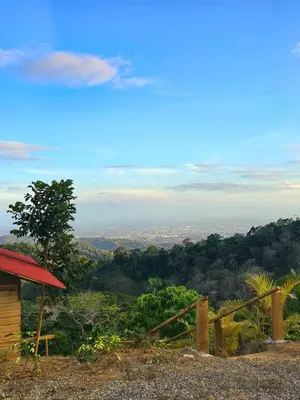 a house on a hill with a view of the city at Mountain refuge - Cabin with wonderful views! in La Búcara