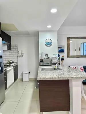 a kitchen with a sink and a counter top at Cozy Beach Condo Great Views in Guayacanes