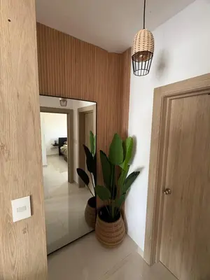 a hallway with a potted plant in a room at Terraza Caribeña in Bayahibe