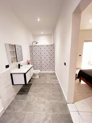 a bathroom with a sink and a toilet at Colina Residence in Las Terrenas