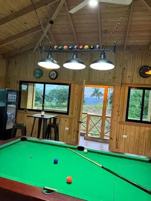 a billiard room with a pool table in it at Villa con piscina Infinitive in Concepción de La Vega