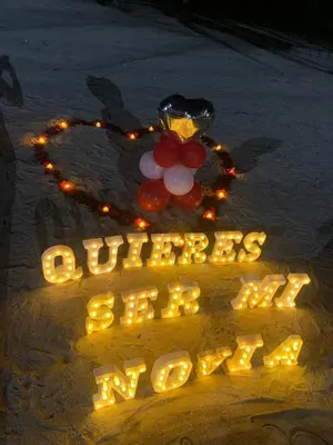 a sign in the sand with a bunch of balloons at Jardines del Mar Todas las Amenidades Reserva Inmediata in Villas del Mar