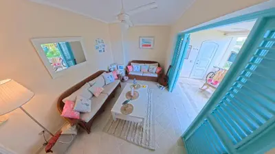 an overhead view of a living room with a couch at La Dolce Vita Beachfront Apt 9 in Las Terrenas