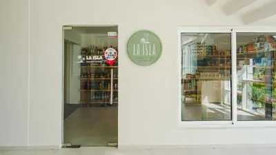 an open door to a store with a pharmacy at Luxury Apt with Pool Golf View in Hard Rock Golf in Punta Cana