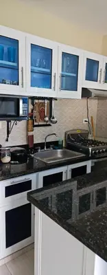 a kitchen with a sink and a counter top at Sweet Home in Monte Llano