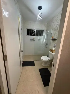 a bathroom with a toilet and a shower and a sink at Sweet dreams Tropical paradise in San Isidro