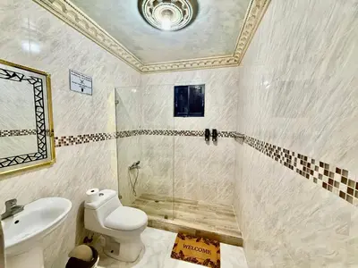 a bathroom with a shower and a toilet and a sink at corales apartamento lll in La Viva