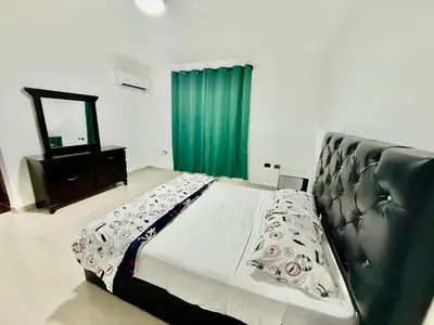 a bed in a room with a mirror and a bed sidx sidx sidx at corales apartamento lll in La Viva