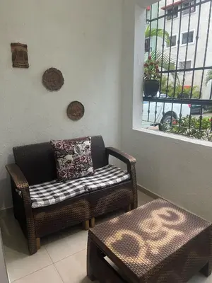 a living room with a couch and a window at Beautiful accommodation in Los Paredones