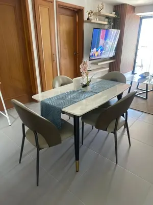 a dining room with a table and chairs at Gaby Luxury apart in Santo Domingo