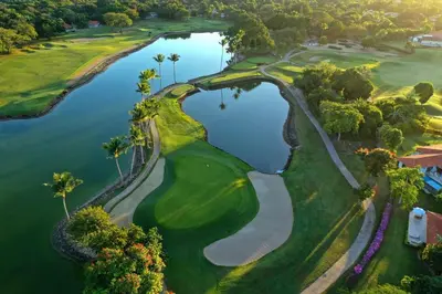 an aerial view of a golf course with a lake at Villa en Casa de Campo 10127 in Colorado