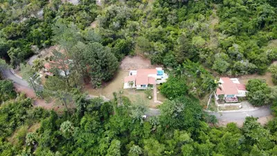 an aerial view of a house in the forest at La Mansion en SAJOMA Villa 15 3br with private Pool in San José de Las Matas