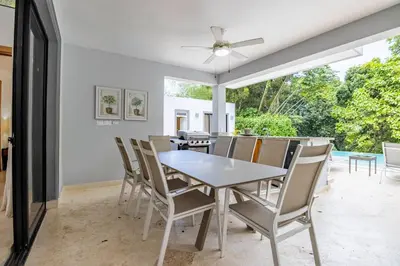 a dining room with a table and chairs at Casa Linda Villa 767 - Sosua in Sosúa