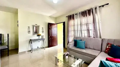 a living room with a couch and a table at Oasis de Paz 04 in Colorado