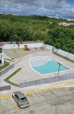 a car parked in a parking lot next to a swimming pool at Ideal with a Jacuzzi, pool in Colorado