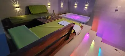 a room with a bed and a bath tub at Vibe Residence Gorgeous Penthouse with Jacuzzi & outstanding Sea & Natural Preserve view in La Laguna