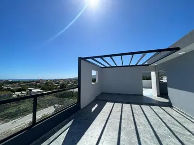 a room with a balcony with a view at Acogedor apartamento in Colorado