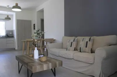 a living room with a couch and a coffee table at Depto entero, Coral Village D204, WIFI, TV, cerca de la playa in Punta Cana