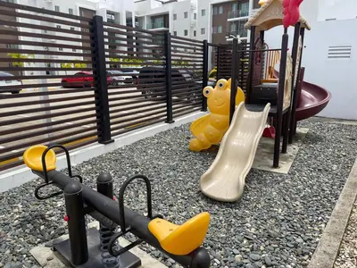 a playground with a childs play area with a squirt gun at Modern Apt in Santiago w Pool, 3 Bedrooms, Air conditioner in Santiago de los Caballeros