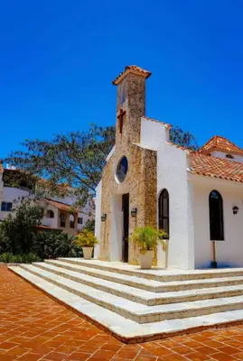 a church with steps in front of a building at Cadaqués best sunset in La Fragata