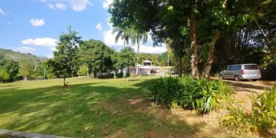 a van parked in a park with a tree at Essential Life La Cuaba Casa de Campo Amenities in Pedro Brand