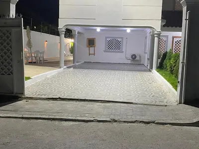 an entrance to a house with a white door at Villa Gordon in Santa Cruz de Barahona