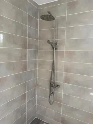 a shower with a shower head in a bathroom at Aparta Estudio Disponible