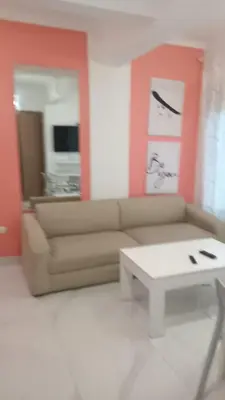 a living room with a couch and a coffee table at Cozy apartment in Boca Chica in Boca Chica