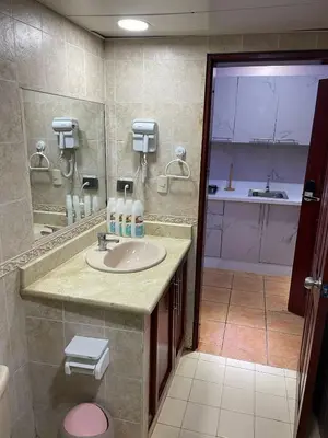 a bathroom with a sink and a mirror at Juan Dolio paradise in Villas del Mar