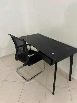 a black computer desk with a black chair at Hannabi Hotel in Boca Chica