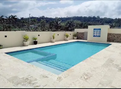 a swimming pool in a villa with a view at Luxury apartment in Cabrera in Cabrera
