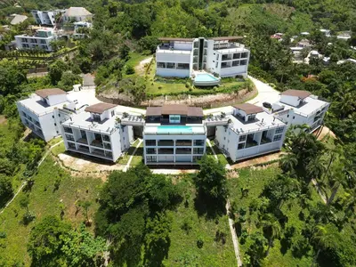an aerial view of a house in the forest at Peaceful 2BR 2BA in Bonita with Pool and Palm Tree Views in Las Terrenas