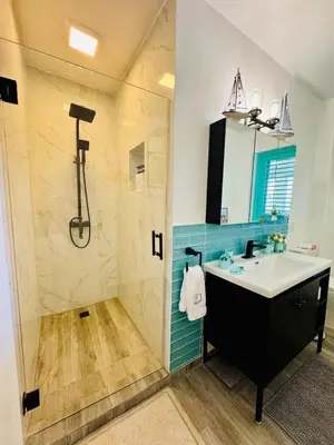 a bathroom with a sink and a shower at Romantic Beachfront Retreat In Las Terrenas - Everything You Could Want - 2 Rooms in Las Terrenas