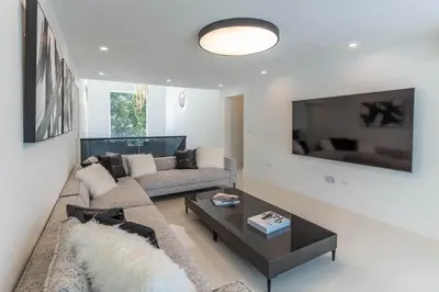 a living room with a couch and a coffee table at Casa Deco in La Romana