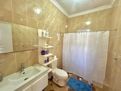 a bathroom with a toilet and a shower and a sink at Villa Rosa 3 Habitaciones Balcones Aire Acondicionado Espacio Ideal Para Tu Familia O Grupo in Río San Juan