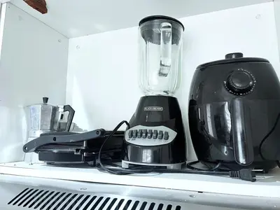 a blender sitting on top of a counter at Family-friendly apartment near the beach in Boca Chica