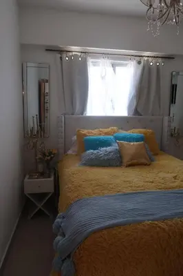 a bedroom with a large bed with a window at Boca Chica in Boca Chica