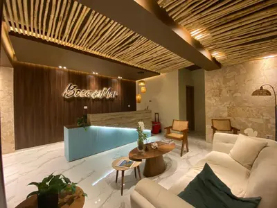 a living room with a couch and a table at Apartamento en Boca Chica T3 602 in Boca Chica