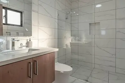 a bathroom with a toilet and a sink and a shower at Privacy, Big, Exclusive in Sosúa in Sosúa