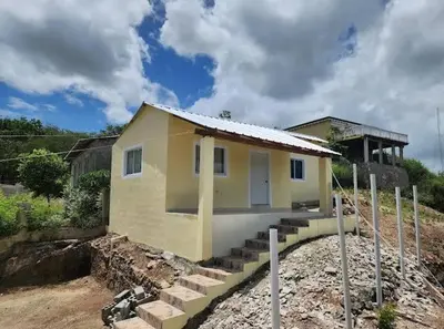 a small house is being built in a field at Villa Janel in Punta Rucia