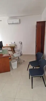 an office with two chairs and a desk and a computer at Casa Perez CCC in Juan Dolio