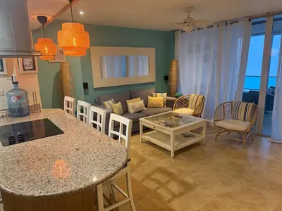 a living room with a couch and a table at Juan Dolio Beach, Marbella Ocean Front in Colorado