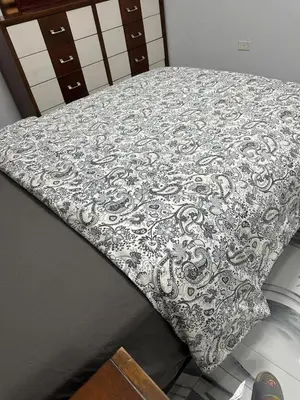a table with a blanket on top of it at Apartamento Oasis in La Caleta