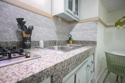 a kitchen with a sink and a counter top at Estudio 2 Conde 504 at Historic Main Street in Santo Domingo