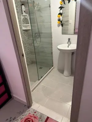 a bathroom with a shower and a sink at Residencial habitat uno in Los Paredones