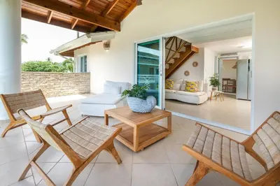 a living room with chairs and a table at Casa Zelima, a fully equipped apartment in Las Terrenas