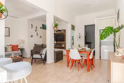 a kitchen and living room with a table and chairs at SDQ Colonial Zone an great find in Santo Domingo